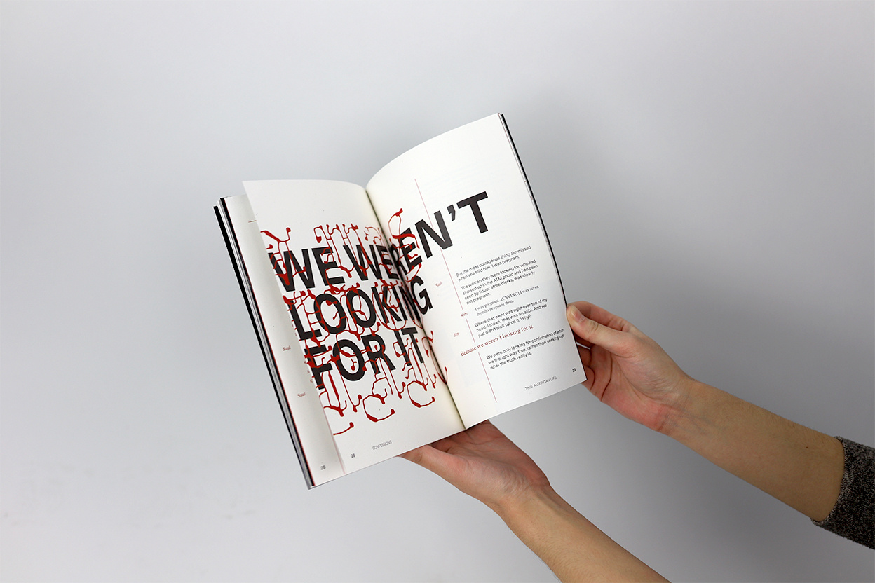 Hands opening book to type-driven spread