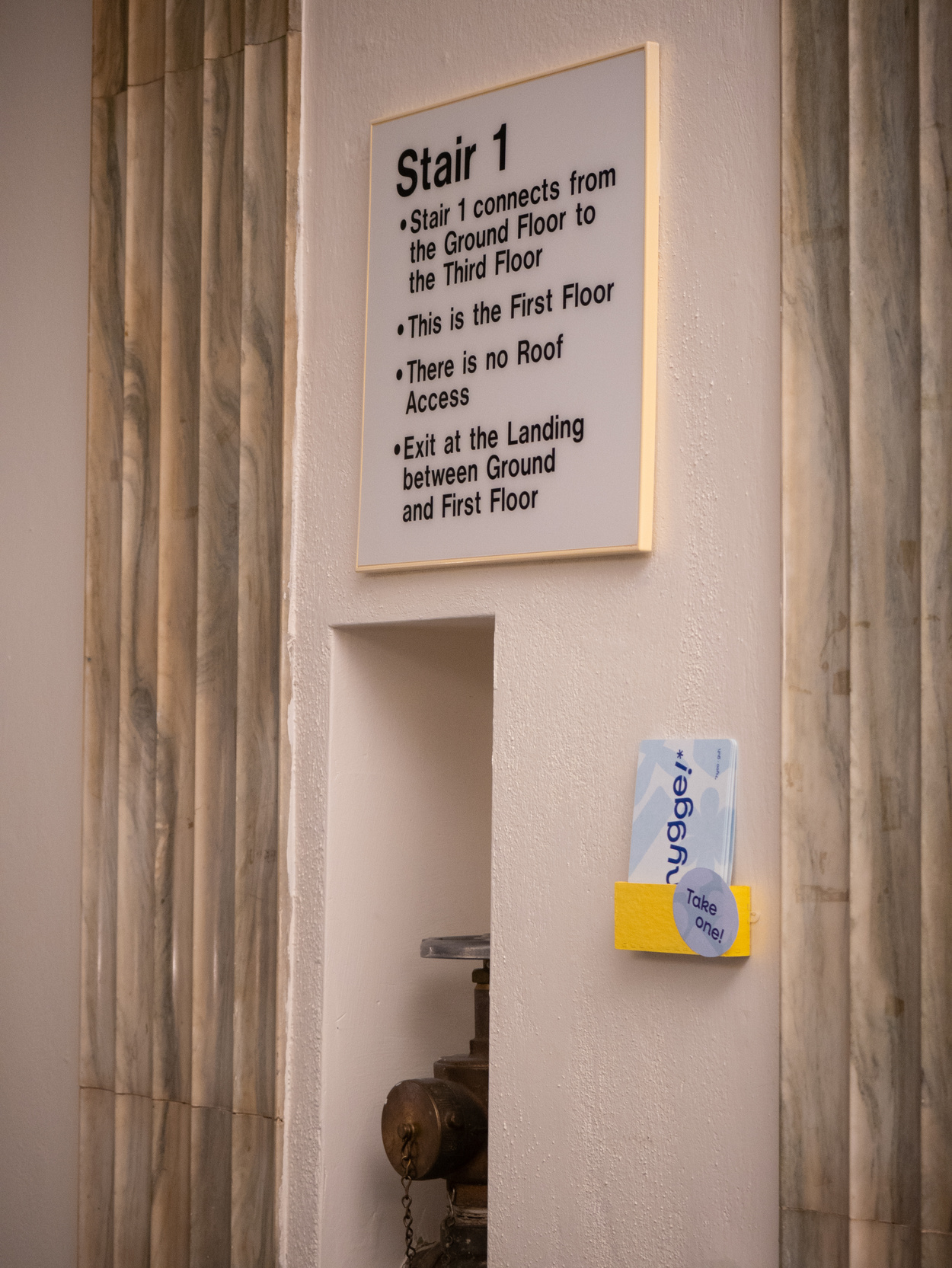 Hygge postcards under signage