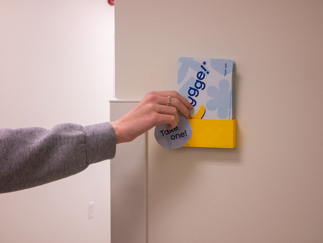 Hand grabbing postcard